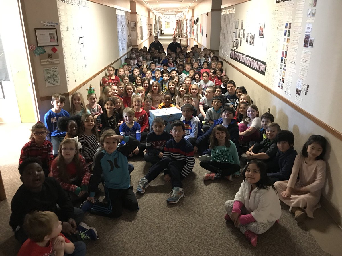 2ndkittyqueen's tweet photo. Our 2nd graders presenting their ‘Family Time’ boxes to Fishers Cops for Kids. Thank you, families, for your generous donations! @BSEhseIN #kindnesscounts #kidswrappinggiantboxesishilarious https://t.co/D3im0na5GY