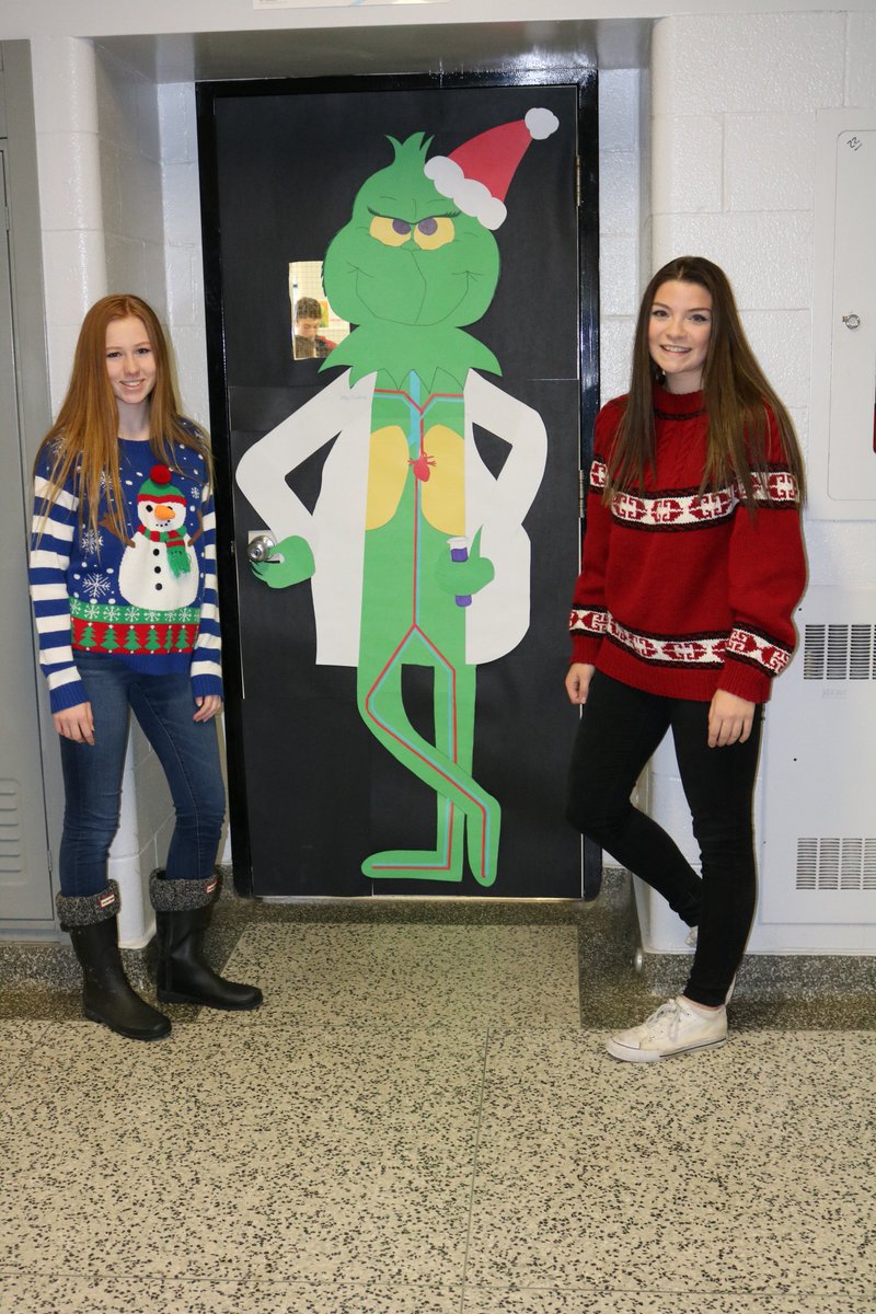 r_daber's tweet photo. A Christmas Spirit Grinch with a Biology twist. Thank you Kaitlyn & Keyanna...incredible detail. RCI Science never looked so good! #rciroom300 #spiritoftheraiders #incredibleskill https://t.co/VpYUtPi7Ow