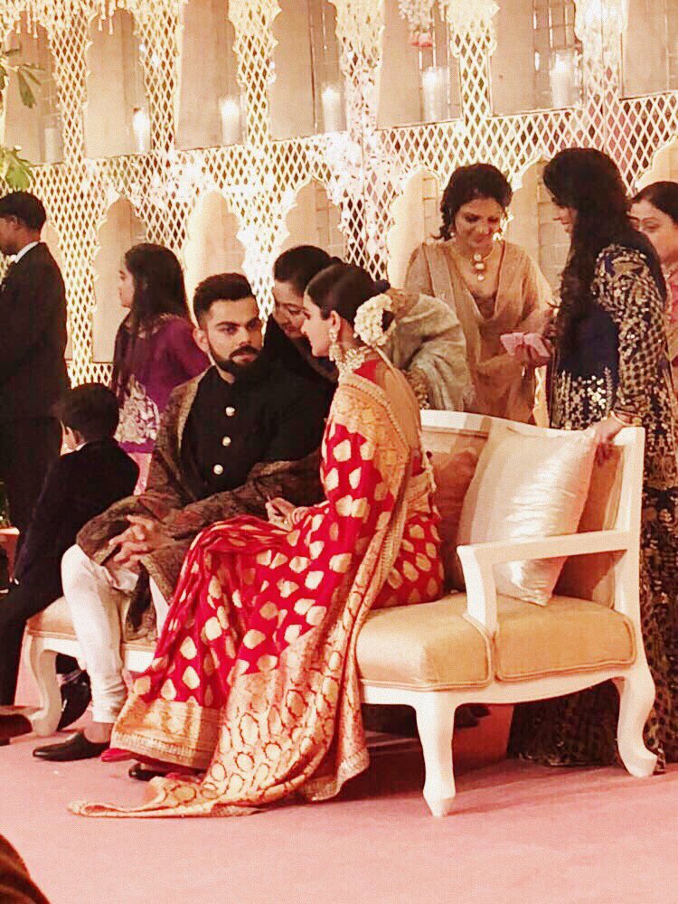  @AnushkaSharma &  @imVkohli while on stage   #VirushkaReception  #Virushka  #VirushkaWedding