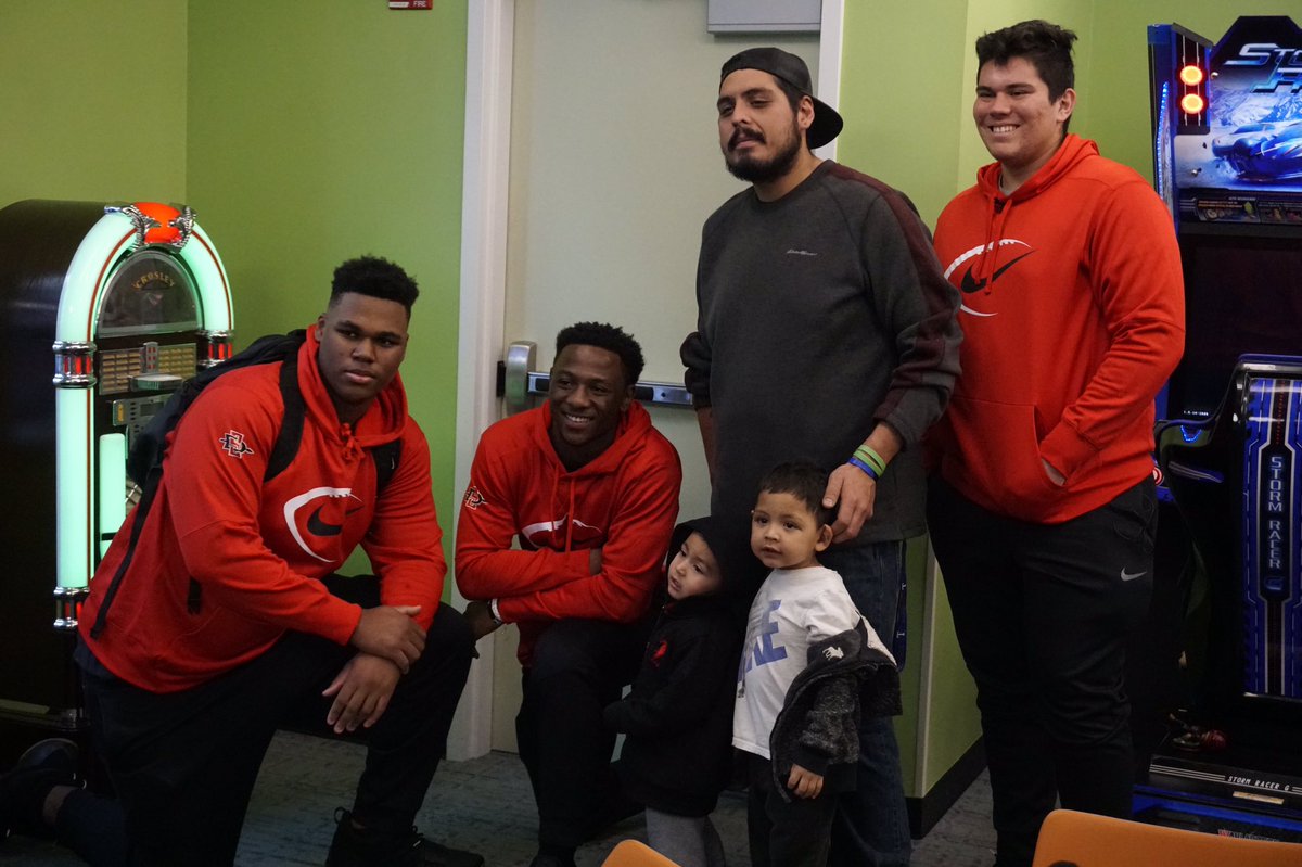 AztecFB's tweet photo. Thrilled to be at @CookChildrens today visiting some special fans with @ArmyWP_Football! https://t.co/vt5EiblMAr