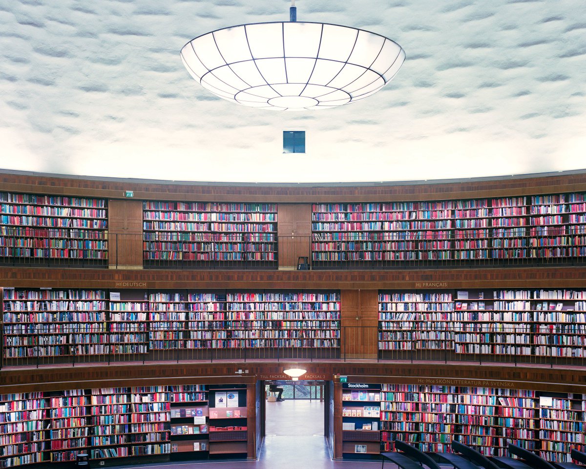 WIRED's tweet photo. There's beauty in books. With 2 million volumes of books and 2.4 million audiotapes, the Stockholm Public Library is truly a sight to behold. See more stunning shots of the spaces that hold humanity's knowledge here: https://t.co/9jCY9mE1Ay https://t.co/3uIs1GG9Pm