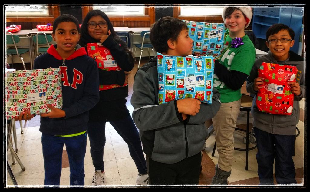 DC_Educator's tweet photo. Kiddos in Grade 6 loved the presents! @miss_lundgren5 @WestBroadwayMS @BankRhodeIsland #WBMSfamily #WarriorPride https://t.co/F9htJlrUpD