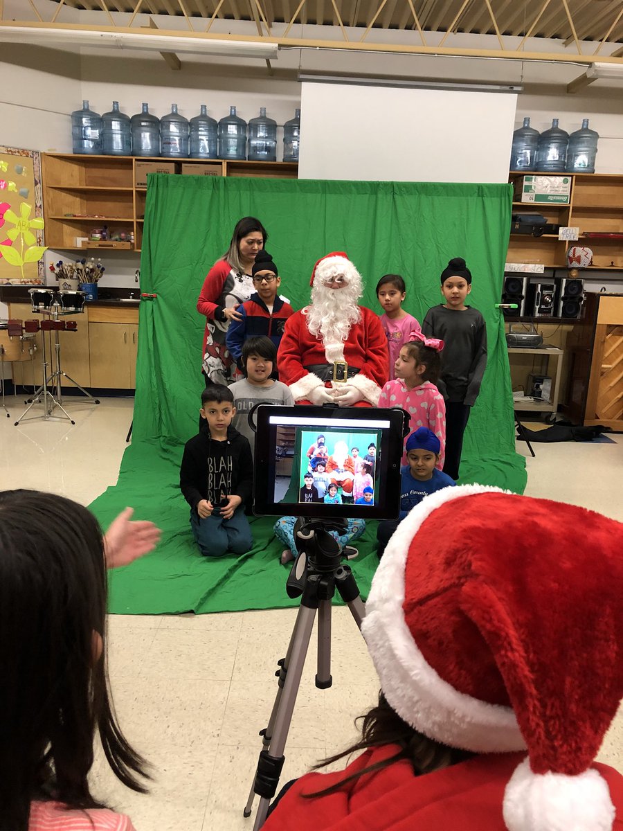 wendylgroot2's tweet photo. Gd 5&amp;6 students holiday green screening with gd 1&amp;2 students. Special visit from Santa. @tyndallparkWSD https://t.co/n182LmRW7h