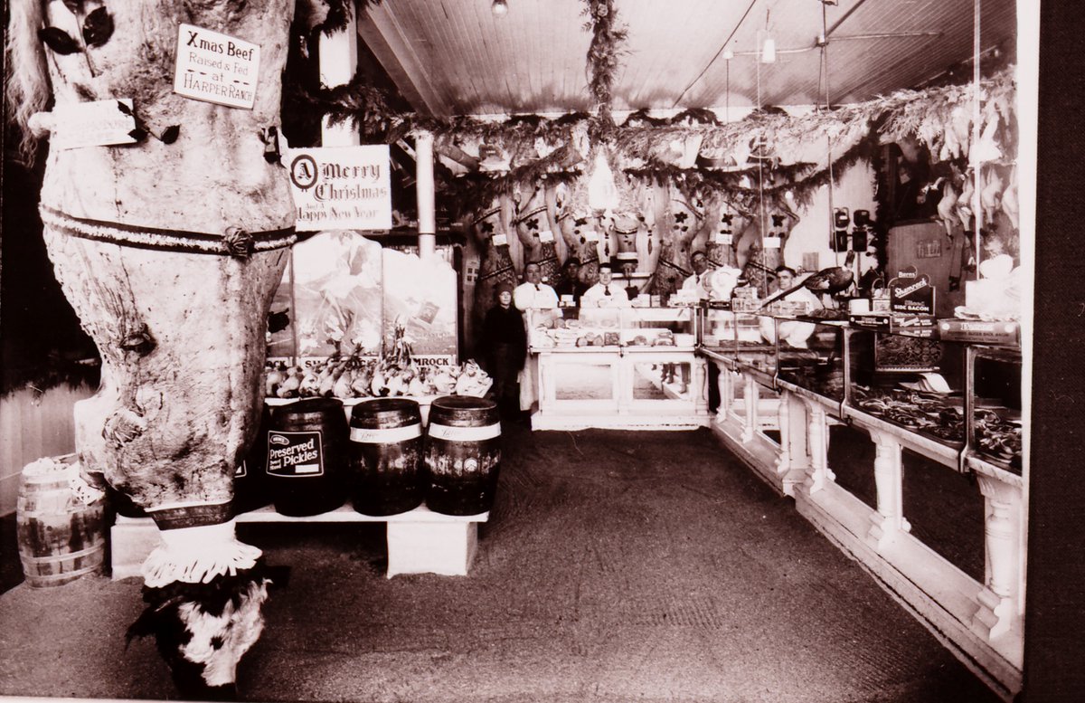 kamloopsmuseum's tweet photo. Happy Winter Solstice! Our Archives Advent Calendar for today revealed this  image of a an unidentified Meat Shop's Christmas display. Note the sign on the beef - "Xmas Beef raised &amp; fed at Harper Ranch." https://t.co/ifpYqMFlXC