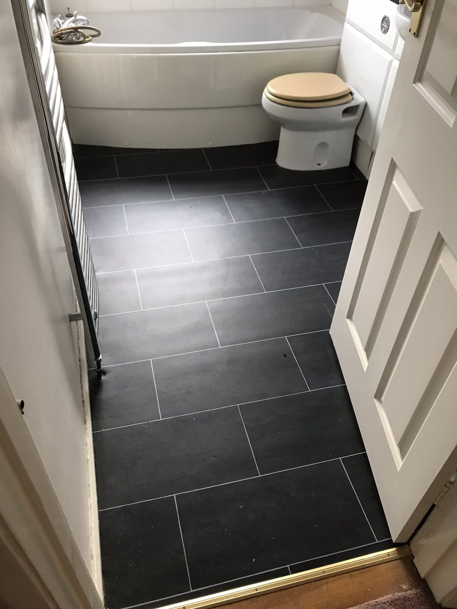 JoeTheglassguy's tweet photo. Another job well done. Relayed some Lino to uplift this tireooking bathroom. #jobdone https://t.co/T6PlQCiP64