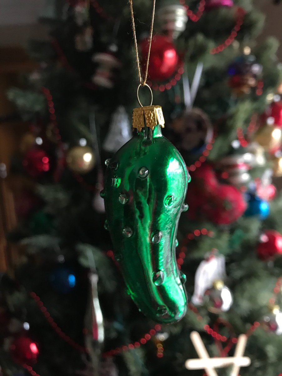 Oddment_Tweak's tweet photo. @hankgreen the Christmas pickle is a German tradition where the first person to find it on Christmas morning gets a special present. We just fight over who gets to hang it on the tree each year. https://t.co/Ra11CumuS0
