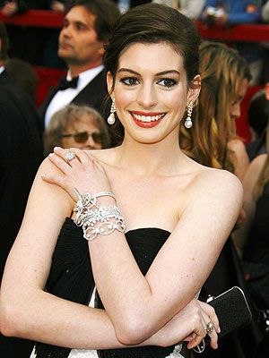 So, Ladies, what do you think of the Jewels on Anne Hathaway's wrist? Your style or not?