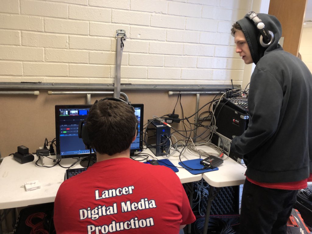 LHS_KRobinson's tweet photo. South School’s meeting went live on YouTube today. LHS TV students directed the event and filled all crew positions. Contest winners arrived at school in a fire truck and a police car and were interviewed by South students. The video can be seen here https://t.co/xEs90GnULB https://t.co/aNSqPYdwPt