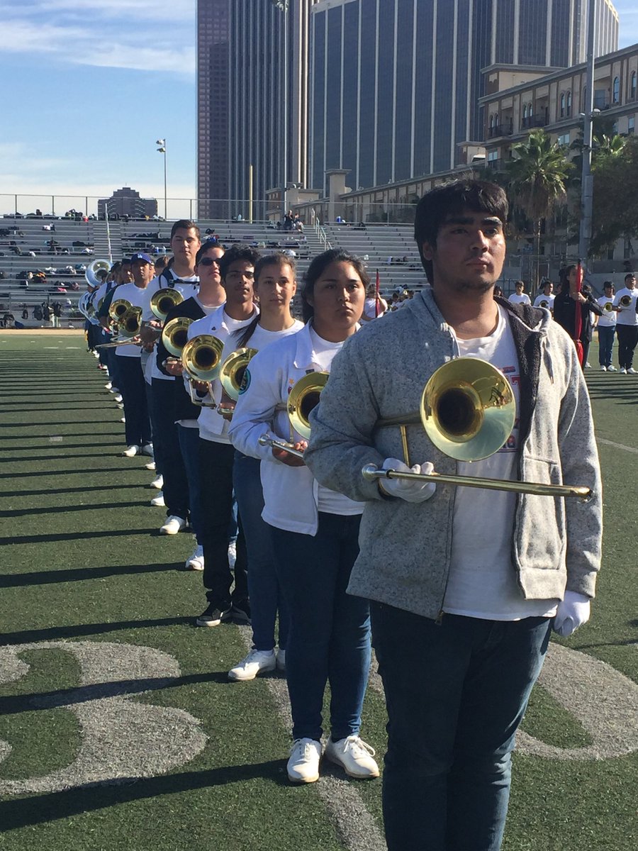 .@BTBLA leads All City Marching Band practice for #RoseParade. Lots of family and friends here to support their kids.