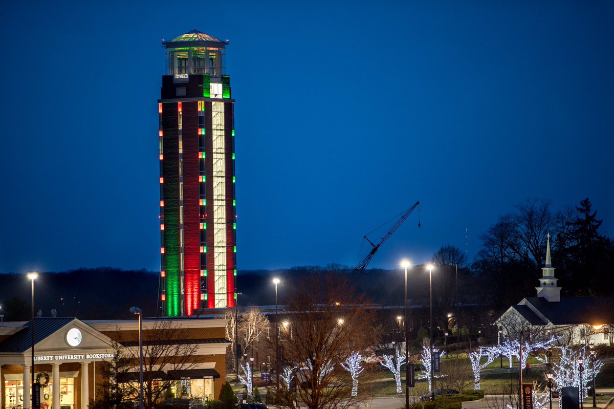 JerryFalwellJr's tweet photo. Great pictures of the @LibertyU Freedom Tower at the new School of Divinity lit in green and red to celebrate the birth of Christ. Merry Christmas! https://t.co/uKtyFlmV7b