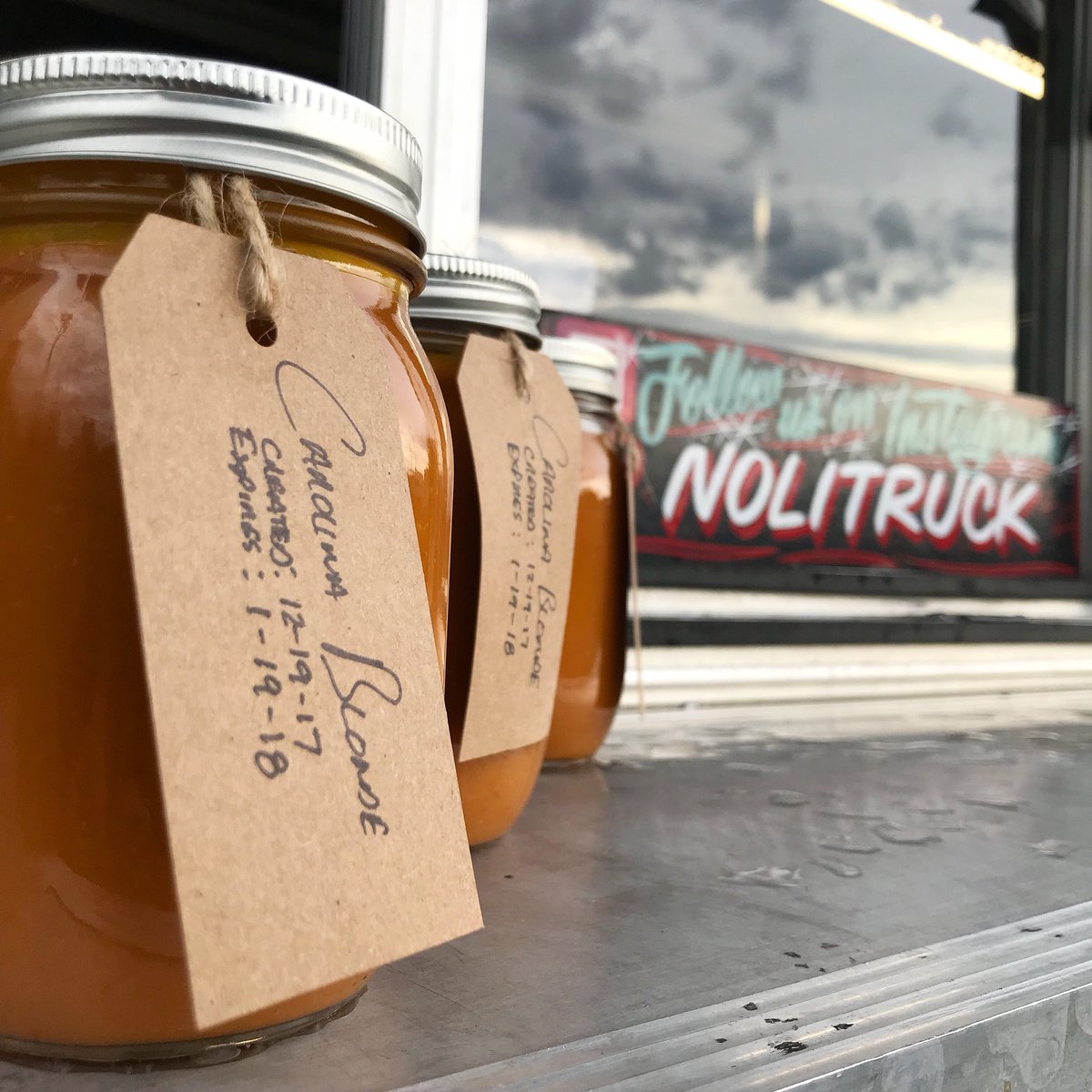 NoliTruck's tweet photo. We’re open today from 11-3 in Founders Park. Last chance to get gift cards & jars of Carolina Blonde before Christmas....we’re closed 24th/25th! #sauced #unchainJC #foodtrucksdoitbetter #tasteTN #dontforkwithnoli https://t.co/u4OXHK1txm