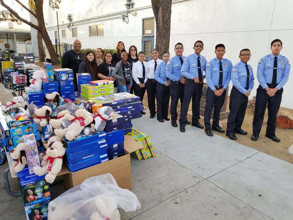 LAonCloud9's tweet photo. In collaboration with @LAPDSouthwest we were able to bless hundreds children for Christmas. Toys for the affected by poverty in South West area. #LAonCloud9 #LAC9 #HaveCompassion #Cloud9ers #LAPD https://t.co/FBNObWD1B2