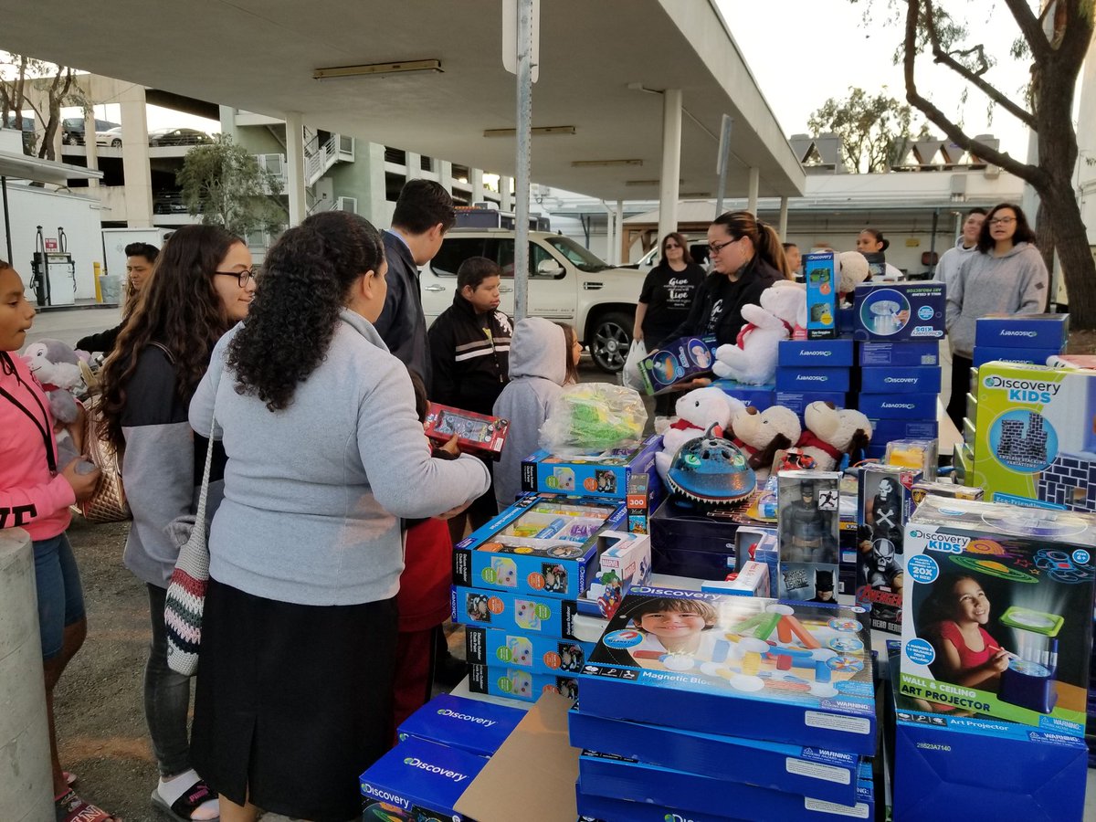 LAonCloud9's tweet photo. In collaboration with @LAPDSouthwest we were able to bless hundreds children for Christmas. Toys for the affected by poverty in South West area. #LAonCloud9 #LAC9 #HaveCompassion #Cloud9ers #LAPD https://t.co/FBNObWD1B2