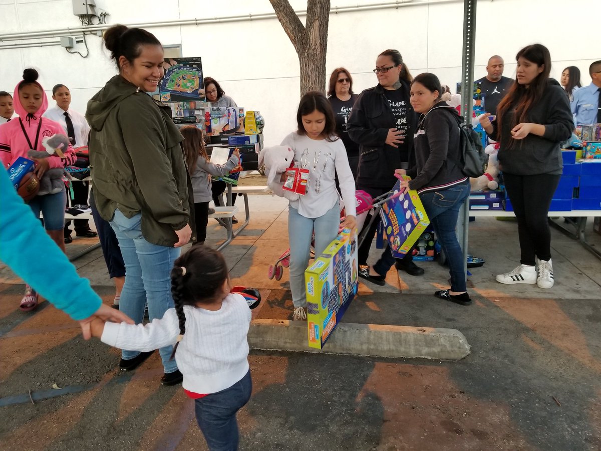 LAonCloud9's tweet photo. In collaboration with @LAPDSouthwest we were able to bless hundreds children for Christmas. Toys for the affected by poverty in South West area. #LAonCloud9 #LAC9 #HaveCompassion #Cloud9ers #LAPD https://t.co/FBNObWD1B2