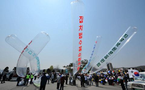 CheVolay's tweet image. Looks like condoms to me. Balloons sent to North Korea