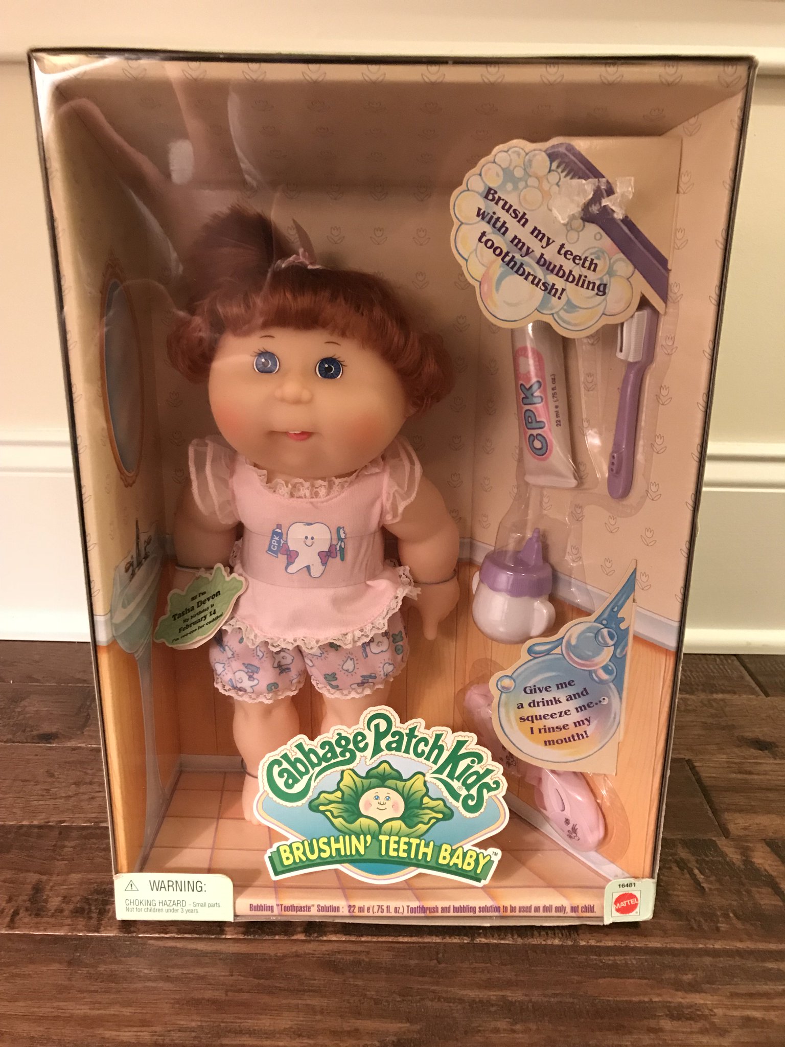 Cabbage patch doll on sale with teeth