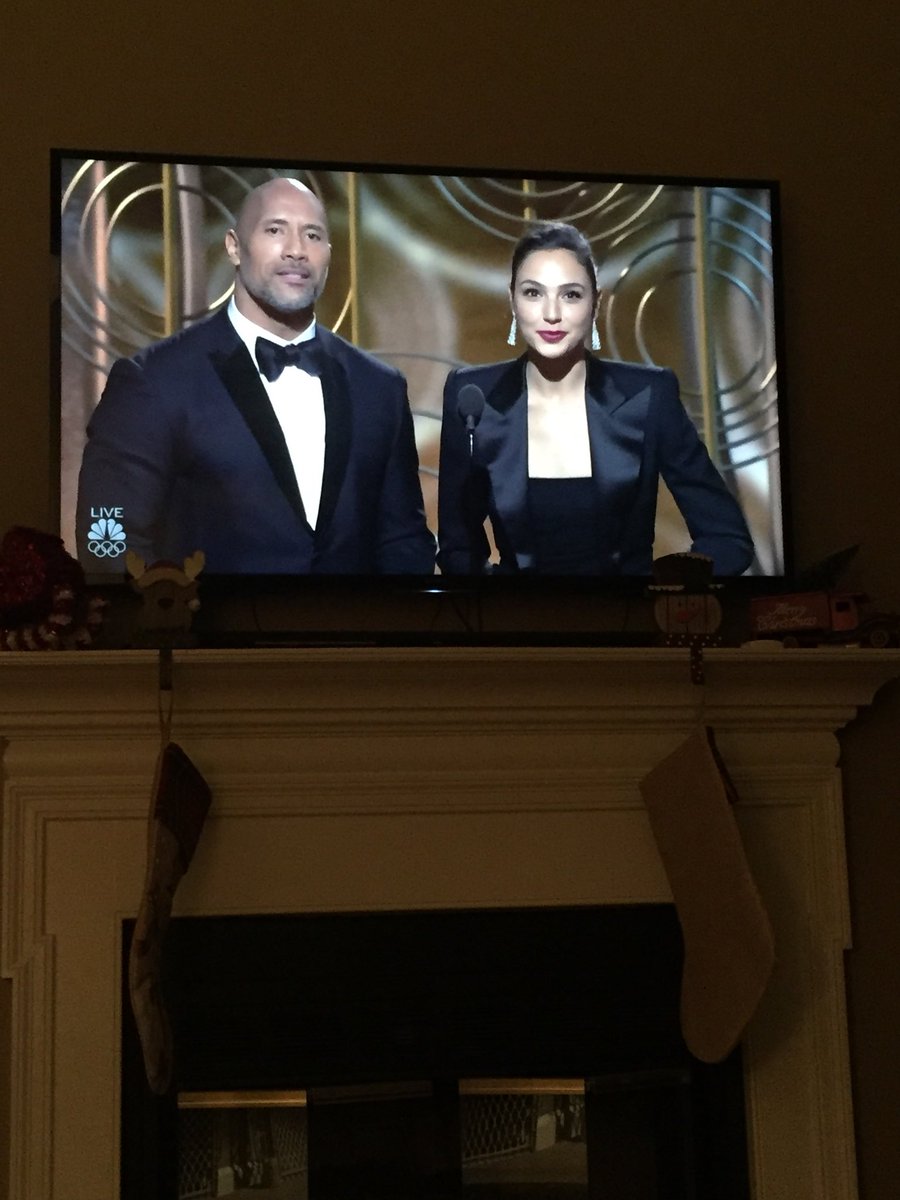 gperkins8's tweet photo. Wonder Women (@GalGadot) and @KevinHart4real Dad (@TheRock) kicking off the @goldenglobes ... what a time to be alive. #Globes75 https://t.co/7pvbJ3OGSC