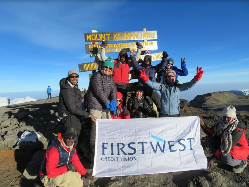 FirstWestCU's tweet photo. Two brave First West employees, Jim and Kevin, recently checked "Climb Mt. Kilimanjaro" off of their bucket lists and supported @PentictonSAR and @FieldsofLife  in the process. Read about their incredible journey in the @PentictonNews https://t.co/FBYEeUTiO2 #LeadWell https://t.co/9HJpc2qbcq