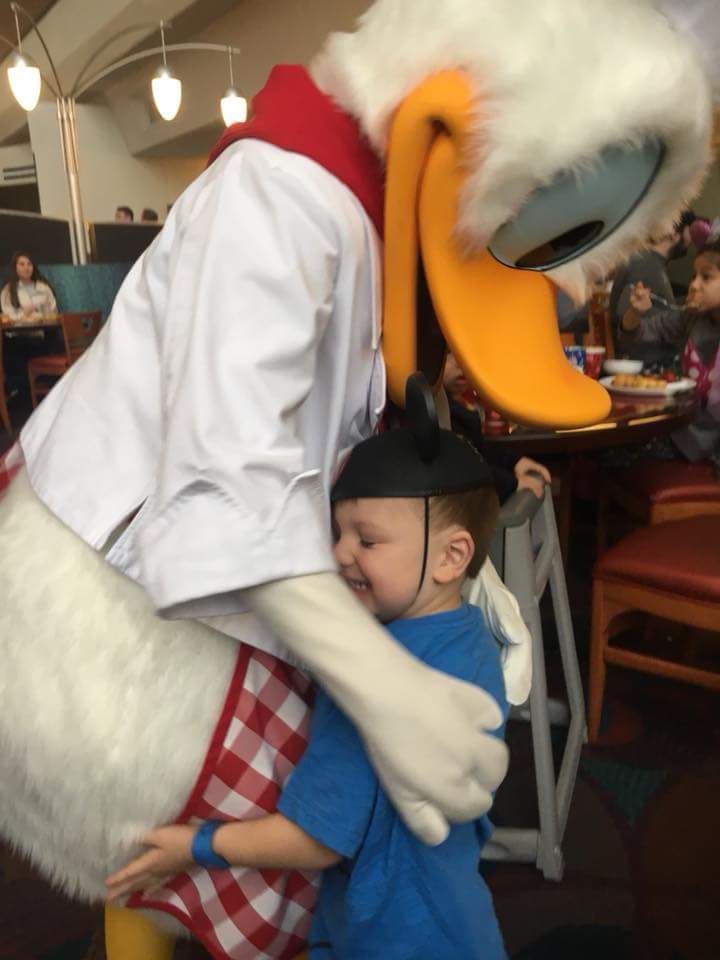 My grandson Hunter giving Donald Duck a big hug at DISNEYLAND