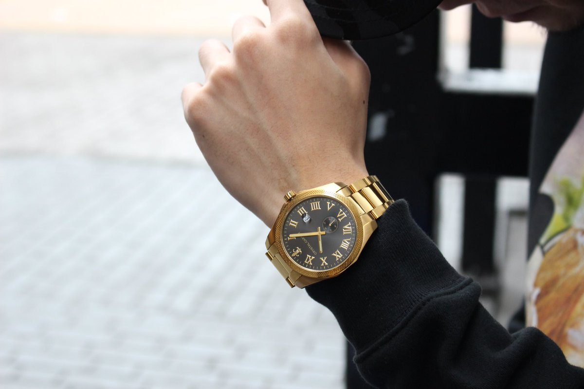 クリスタルカーター 腕時計