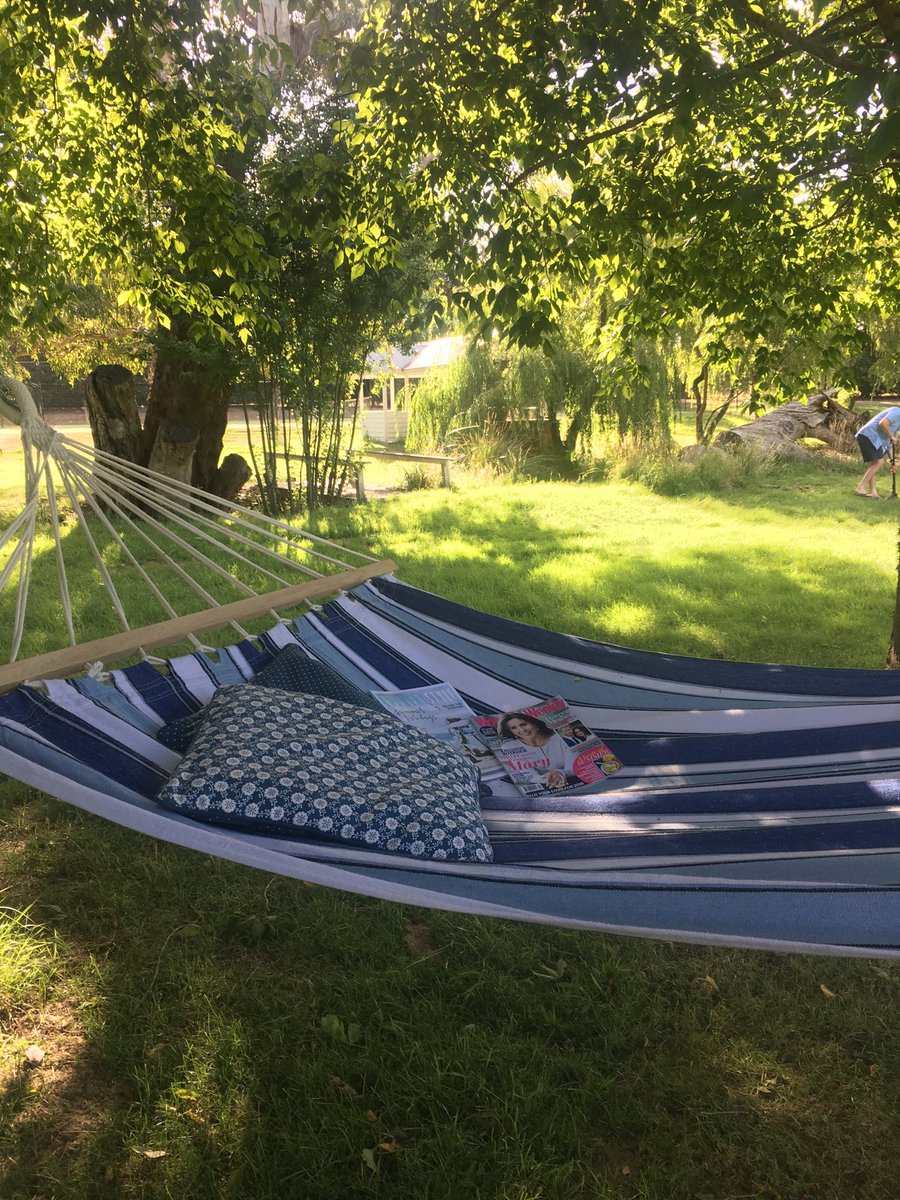HangingRockFarm's tweet photo. Lazy hot Saturday afternoon...complete with great country reading, relaxing while there is help in the garden if you look closely! #womensweekly #countrystyle #woodend https://t.co/FtMfDHuGJe