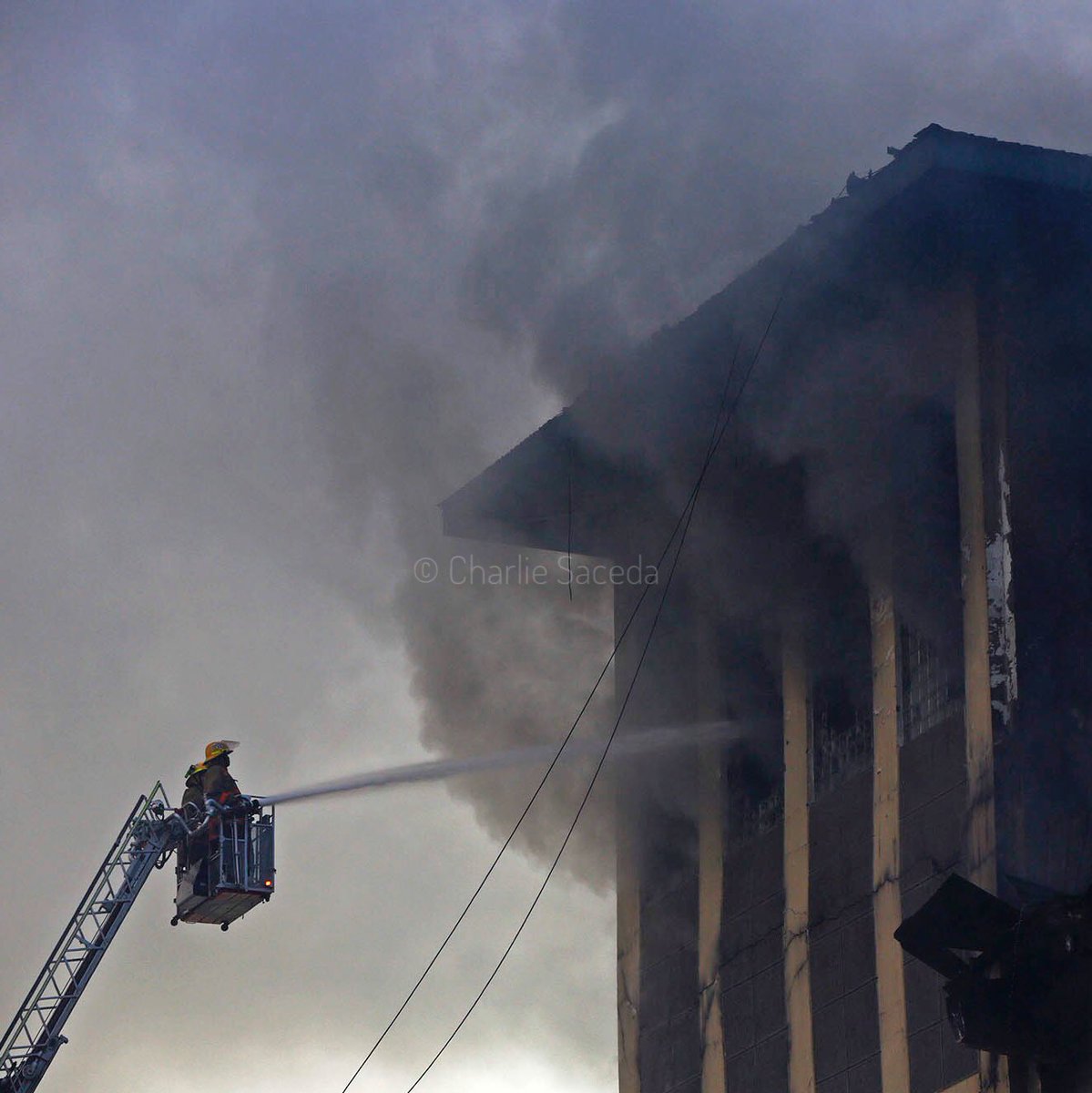 CharlieSaceda's tweet photo. Firemen continue to battle the #fire that has engulfed the #MetroAyala Department Store in #Cebu City since 9:42pm last night.
#photojournalism #photography #malls #firefighter #fireladder #news #reportage #silhouette https://t.co/56DNYl0J0Y