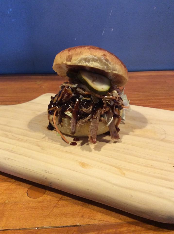 SBBrewWerks's tweet photo. What's new, Twitter? At #SBBrewWerks we've serving up the Superior Brisket Sandwich made w/ IPA cranberry BBQ sauce, zesty slaw &amp; pickles. Drink of the minute is the 'Dubbel Trouble' -- our holiday spiced Belgian Dubbel with a shot of South Bend Rye whiskey. #BeCareful #Beer4Good https://t.co/477iYf2b5A