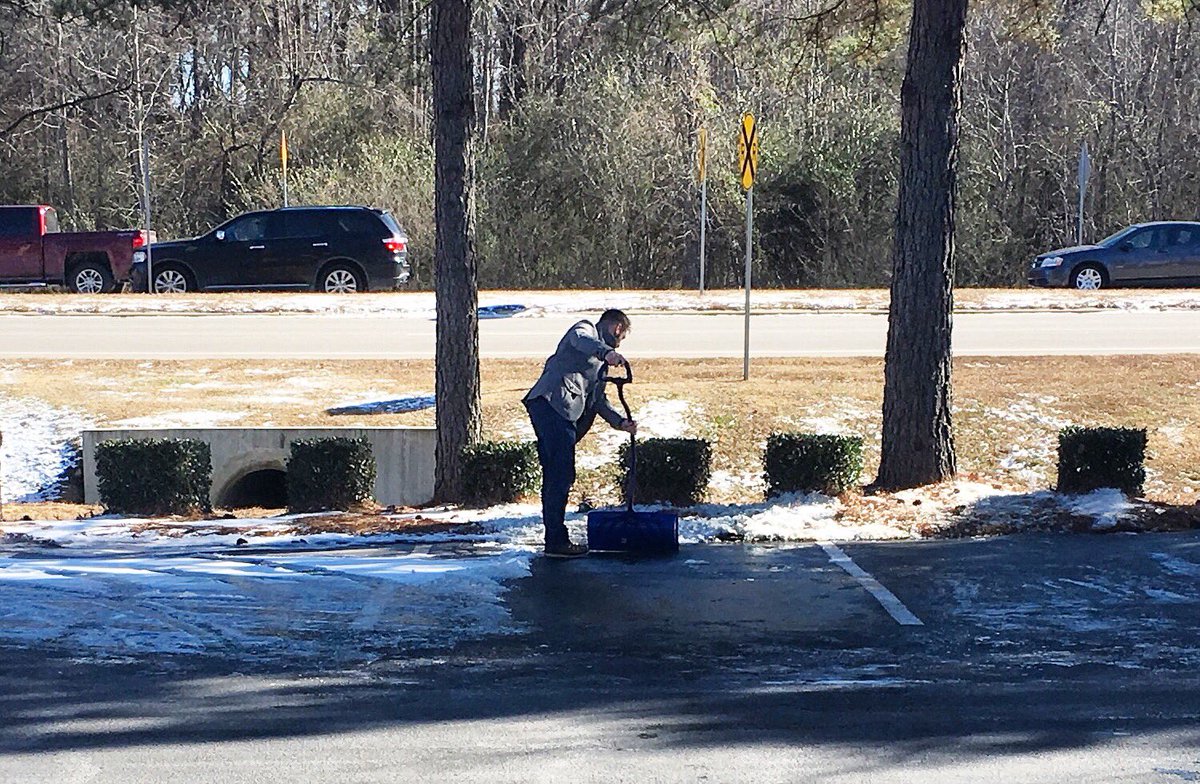 TheGCClayton's tweet photo. Parking lots are being scraped, cleared and salted so we can have church tonight! We have some awesome leaders that serve with a nothing beneath me attitude. Jeremy just happened to be caught by the camera! See you at 6pm if you’re choosing to #takebackyoursunday! https://t.co/23ApoXojYl