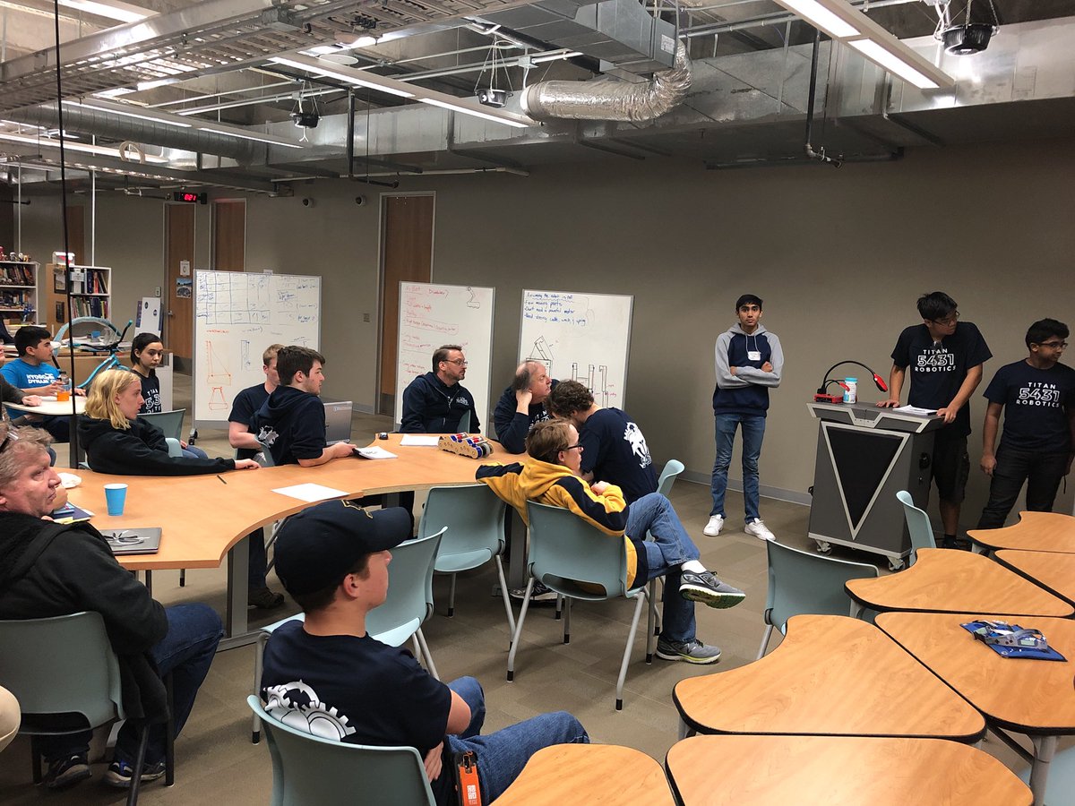 Members of one of our prototype team presenting to the rest of Team 5431! Can’t wait to bring these designs to actions starting tomorrow! <a href="/FIRSTinTexas/">FIRST in Texas</a> <a href="/FIRSTweets/">FIRST</a>