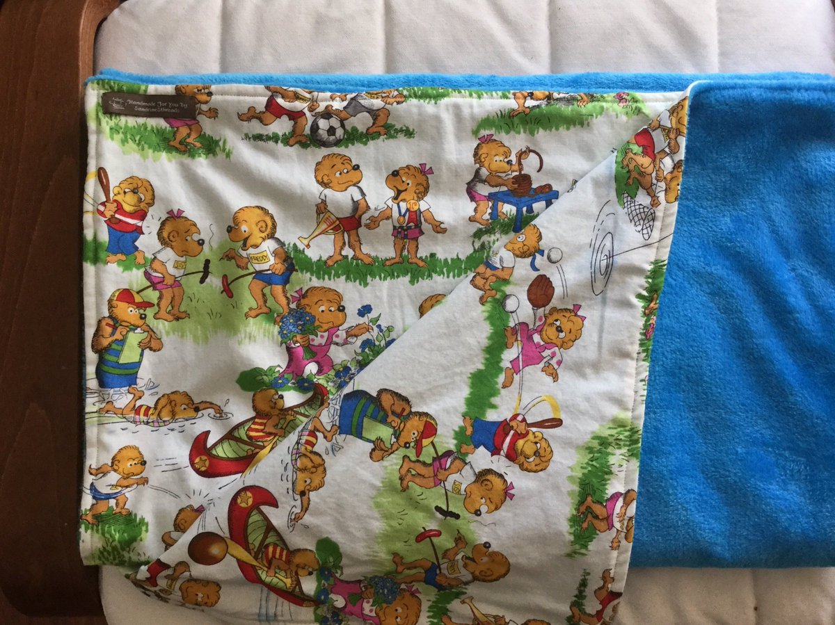 SandrineSthread's tweet photo. Just added in my Etsy store: Toddler blanket, Berenstain Bears, down to $35 from $45, due to a little black mark (it bugs me).  On side is blue plush fleece, the other Berenstain Bear cotton fabric, 42 in x 52.5 inches, https://t.co/EATZucjuRe #babygift #toddlerblanket https://t.co/noikq5NVA2