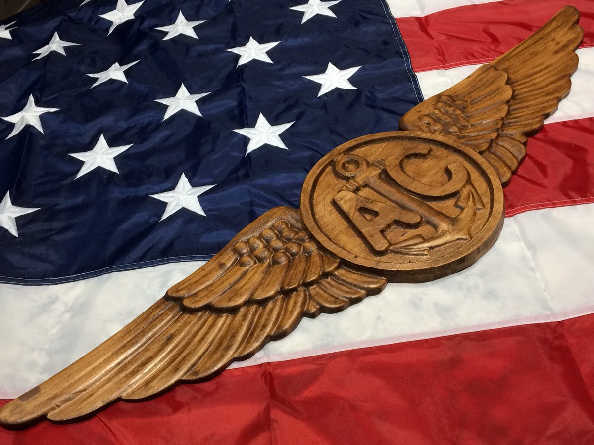 1010graphixs's tweet photo. The completed 3 feet wide US Navy Aircrew Wings project.  This is something near and dear to my heart - earning my wings when I flew for the Navy. This now sits in my shop. Go Navy! #wood #woodwork #woodworking #woodporn #maker #handmade  #woodworking https://t.co/hp07TvVpTs