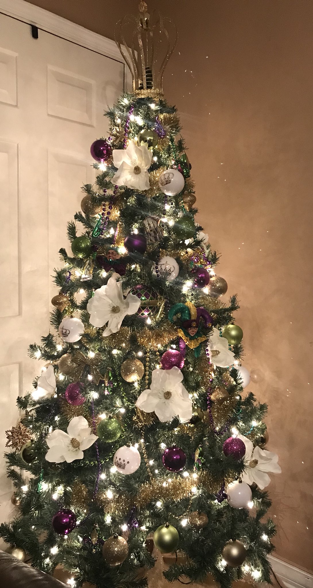 In south Louisiana, we often leave our Christmas trees up until Mardi Gras,  and we re-decorate them for Mardi Gras! : r/christmas