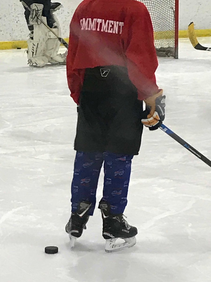 My son’s peewee #hockey coach scheduled a practice during the <a href="/buffalobills/">Buffalo Bills</a> first playoff game in 17 years. So my boy wore #Bills PJs on the ice instead of socks. #BillsMafia