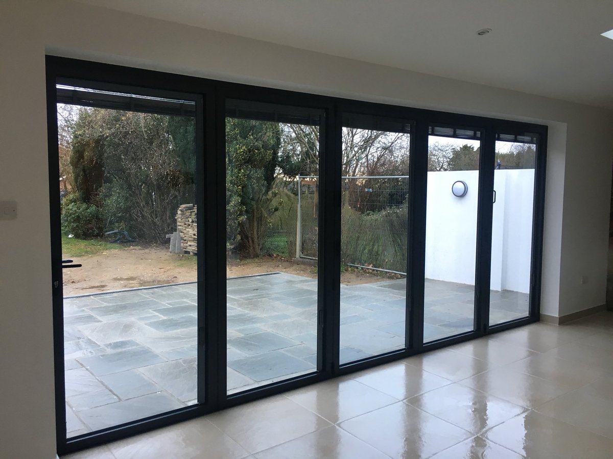 Generation3535's tweet photo. Grey Aluminium Bifolding doors. https://t.co/p56XoTAPpE