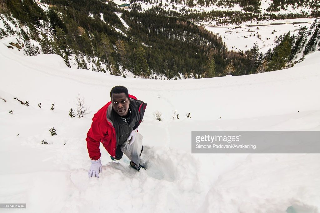 A migrant climbs Colle della Scala during an attempt to reach the French border in Bardonecchia, Turin, Italy, after the police reinforced the Frejus and and Ventimiglia borders. Photo by <a href="/SimonPadovani/">Simone Padovani</a> <a href="/GettyImages/">Getty Images</a> #migrants buff.ly/2C9FGFf