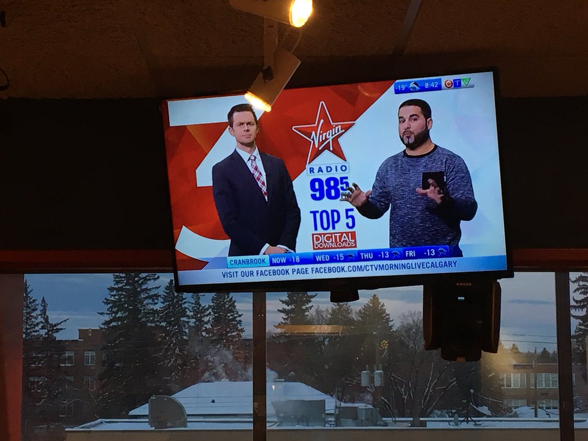 TylerHall403's tweet photo. It was fun doing the Top 5 Downloads with my pal @CTVStanfield on @CTVMorningYYC this AM! (I was standing on a LARGE platform to appear reasonable close to the same Height as #WeatherManStan ๐คฃ) https://t.co/jYBgBEmEpN