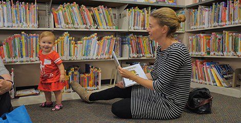 mom reading to child