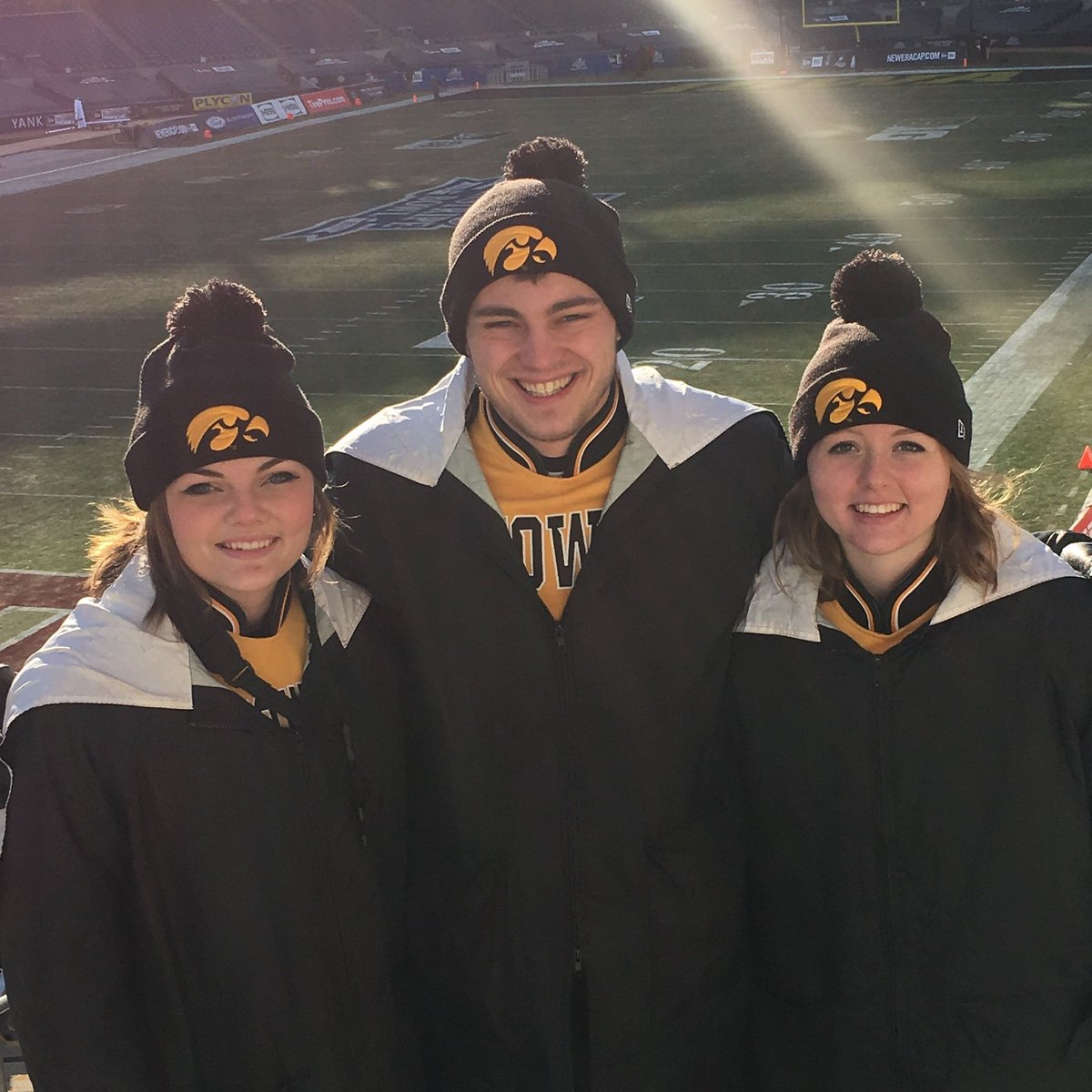 SLMusicDept's tweet photo. Music can truly take you anywhere, even a frigid Yankee Stadium in New York City. Spirit Lake Music is proudly represented today in the @uiowa Hawkeye Marching Band at the @PinstripeBowl by @SpiritLakeIA alumni Lauren, Will &amp; Paige. We say "GO BAND!" #spiritlakecsd https://t.co/qkKdAQKXIX
