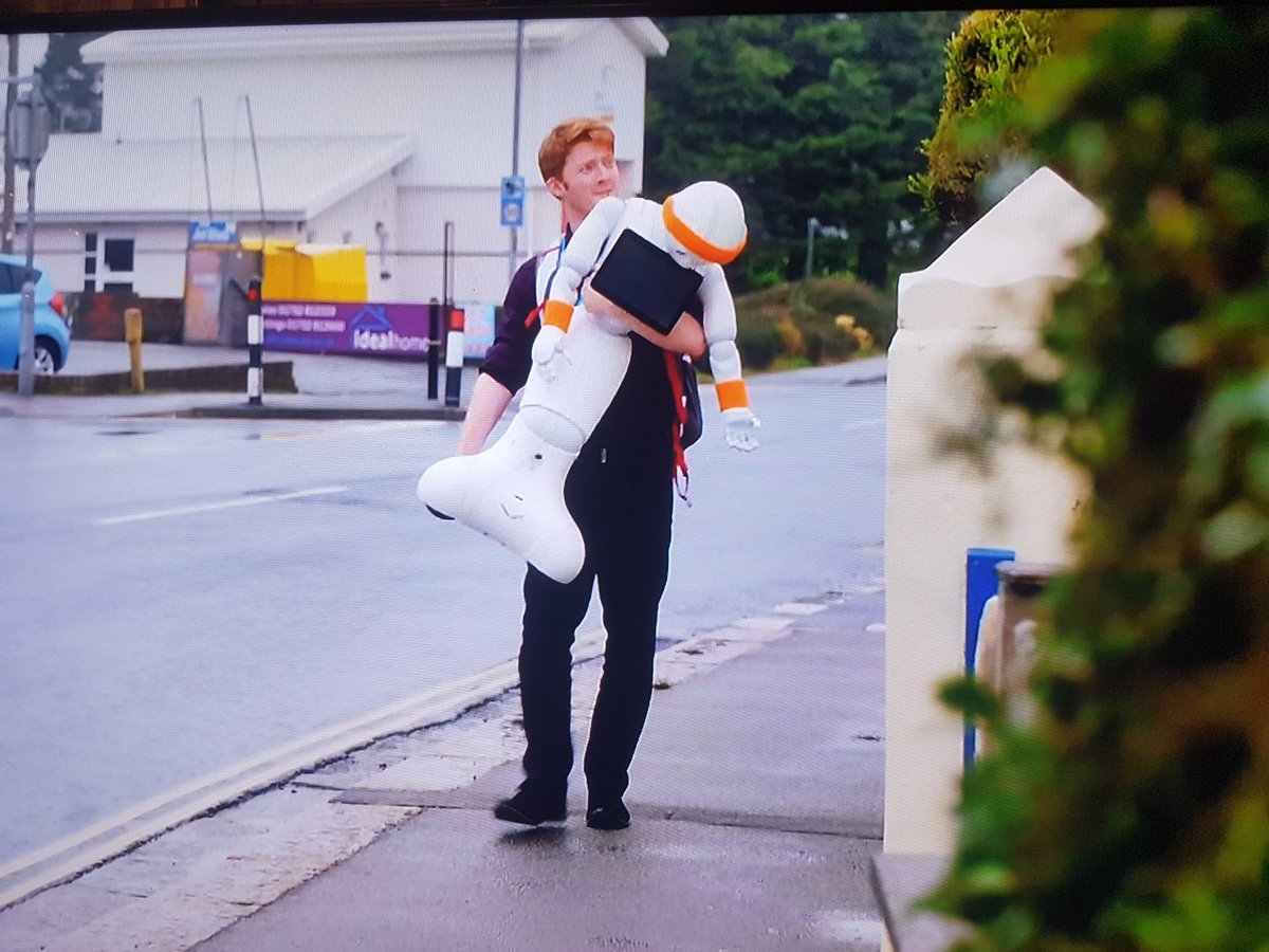 Wahey! BBC Two, there I am carrying "Fitbot". #SixRobotsAndUs #BBCTwo