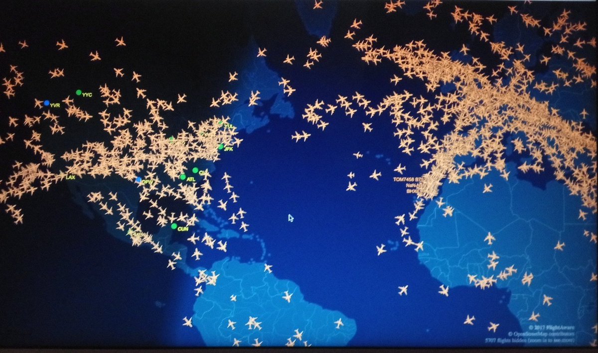 gossyomega's tweet photo. What do these pictures tell you about global trade? 

Screenshots from a live map of flights currently in the air. https://t.co/kjHIIB6z4k