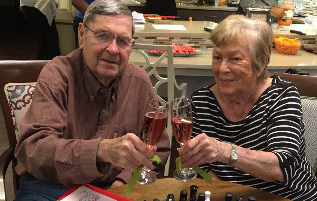 HeartisArlingto's tweet photo. Who doesn't enjoy a long day of pampering w/ bubbly on the side? Heartis residents, Chuck &amp; Kay, toast their new home &amp; friends while Muriel got ready for one of Ladybug’s famous manicures! #HeartisCulture. #FrontierCulture. https://t.co/2324Y7jHYF