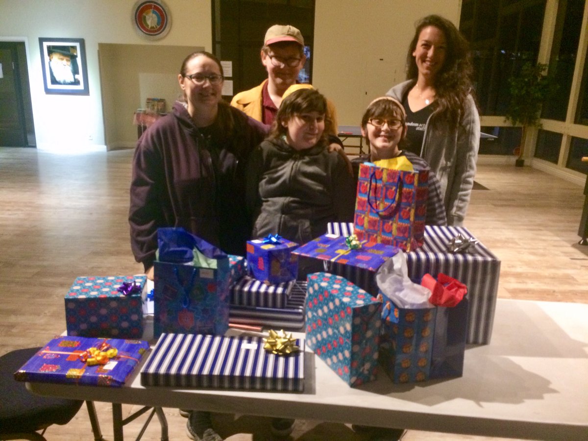 AllieColeseph's tweet photo. Thanks to generous donations from @RandomActsOrg supporters this year, I was able to spread #HolidayKindness to a local Jewish community! I helped a family in need celebrate a warm and happy Chanukah w/ gifts of fun &amp; necessity 💚💙 #GetKind #Giving #Chanukah #Mitzvah #StaffAct https://t.co/wZHOO4v05k