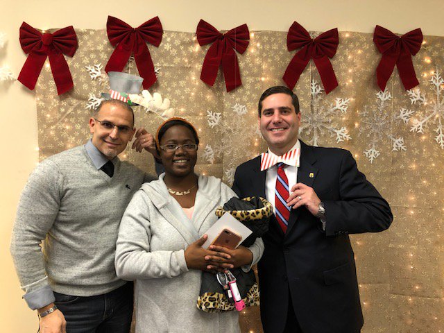 SCPDHq's tweet photo. #Police officers & #SCPDHQ Commissioner @TimSini recently handed out winter jackets, hats, scarfs, gloves, books and toys to people in need in #SuffolkCounty. The items had been donated to #AxisChurch of Medford https://t.co/KgwVToGmTQ