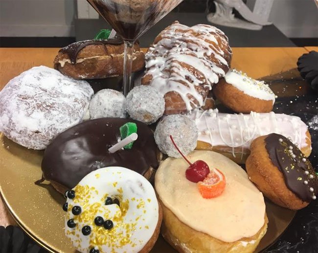 bakemag's tweet image. Wisconsin's @simplesimonbake has created special themed donuts for New Year's Eve. bit.ly/2E6sEZB
