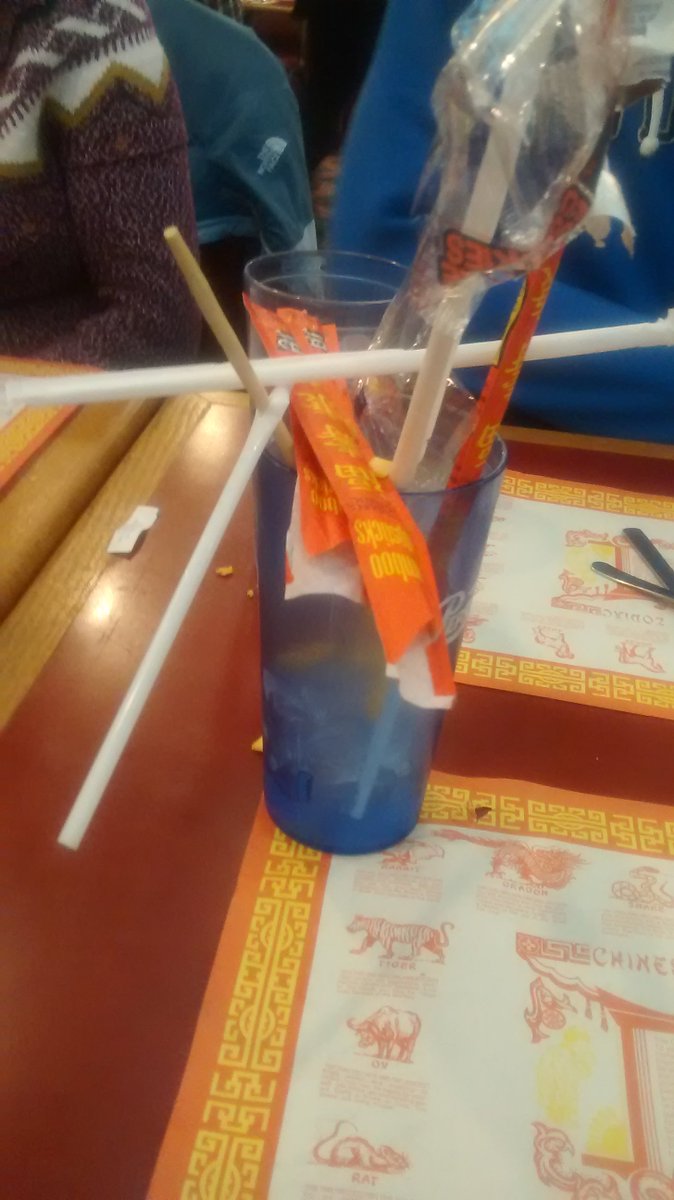 CutterL_'s tweet photo. I got bored at the Chinese restaurant we went to today, so I made a real good sculpture out of the available materials...I feel bad for whoever has to pick up my mess.

#sculpture #GudArt https://t.co/VmTpASNujs