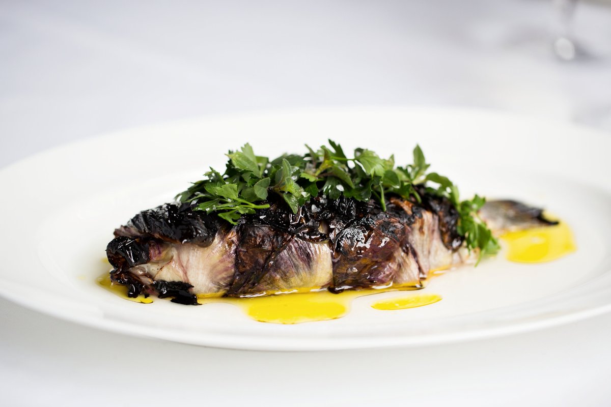 OstraBoston's tweet photo. Served wrapped in Trevisano Leaf along with Extra Virgin Olive Oil, Lemon, Snipped Herbs, and Seasonal Accompaniments, our Grilled Sea Bream is always cooked to perfection! https://t.co/MJIgbjjGvh