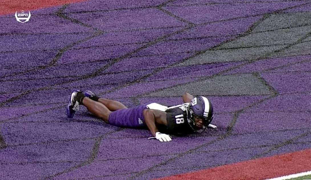 SportsDayDFW's tweet photo. TCU may be taking their purple camo uniforms a little too seriously... #AlamoBowl https://t.co/4xAyPxixwV