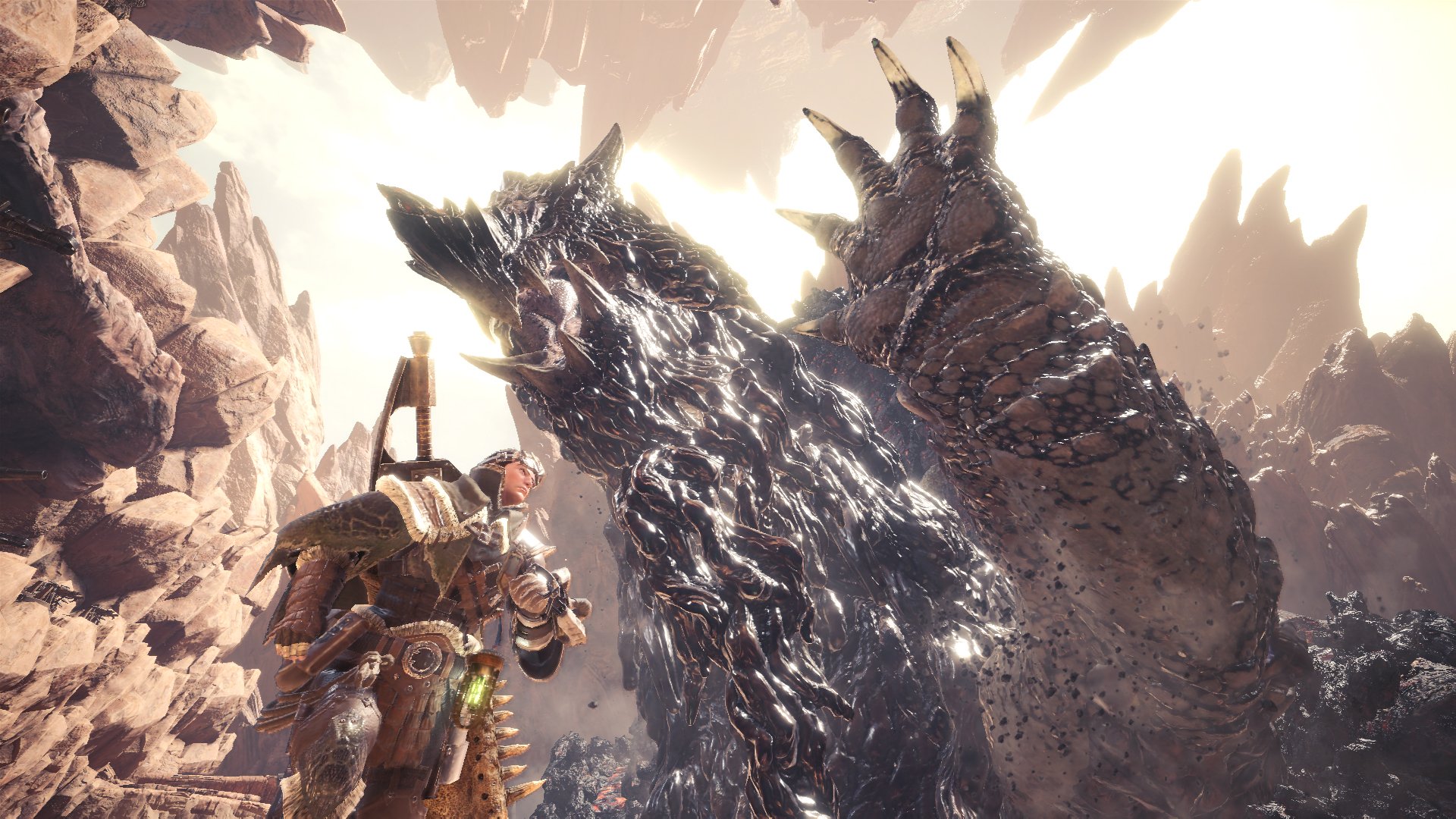 モンスターハンターワールド アイスボーン公式 ゾラ マグダラオス の圧倒的な迫力 大砲やバリスタで迎え撃つ調査員やハンター 大地にそびえる火山を思わせる外殻を持つ古龍 ゾラ マグダラオス どこかを目指して移動しているように見えるが その目的
