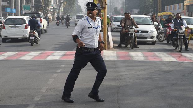 KiaJohnson1's tweet photo. My last #haaibo for the year folks! 'Indian cop moonwalks and keeps traffic flowing' vote for it on the @Radio2000ZA facebook page: https://t.co/dcqLAcM62m https://t.co/M9HbndobDg