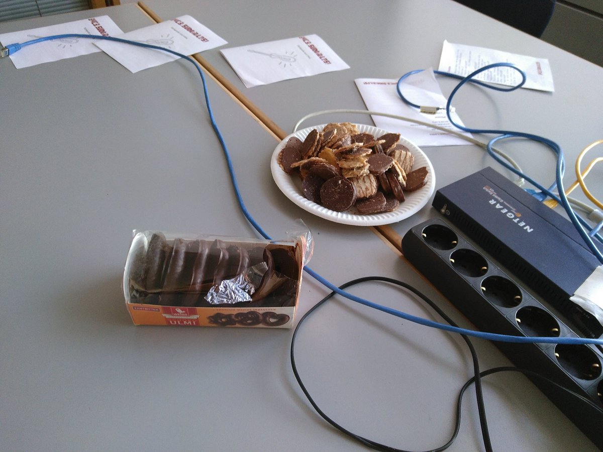 Cookies & gingerbread next to a network switch and power outlets